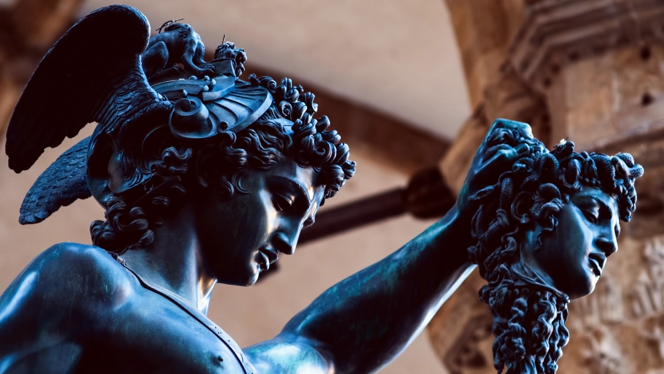Bronze statue of Perseus holding the head of Medusa in Piazza della Signoria square, Florence, Italy, made by Benvenuto Cellini in 1545.